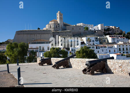 the old walled fortress stands at the top of ibiza town Stock Photo