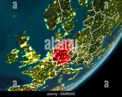 Germany as seen from Earth’s orbit on planet Earth at night highlighted in red with visible borders and city lights. 3D illustration. Elements of this Stock Photo