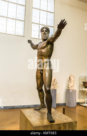 Bronze statue of Zeus or Poseidon in archaeological museum in Athens