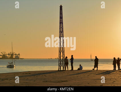 Recreation time at the sunset along the Tagus River, in the civil parish of Santa Maria de Belem in Lisbon, Portugal Stock Photo