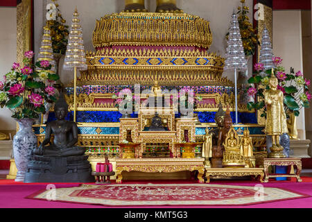 Bangkok, Thailand. Altar below a  Buddha Statue at Wat Saket (Phu Khao Thong), adjacent to the Golden Mount. Stock Photo