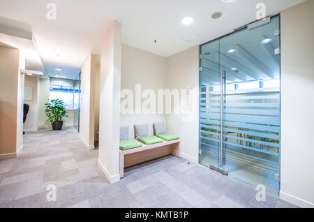 Empty corridor in bright modern office Stock Photo