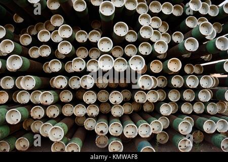 Drilling pipe stacked by an oil well in the Amazon Stock Photo - Alamy