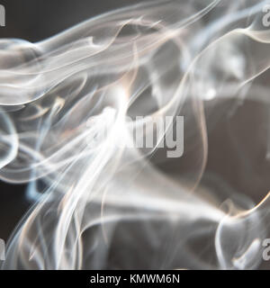 Black and White Background - White Smoke Creating a Random Shapes on Black Background Stock Photo
