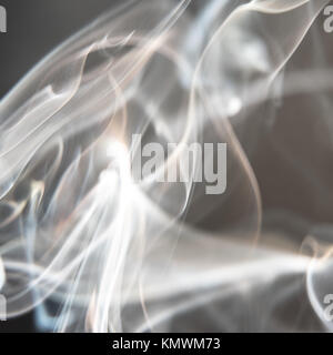 Black and White Background - White Smoke Creating a Random Shapes on Black Background Stock Photo