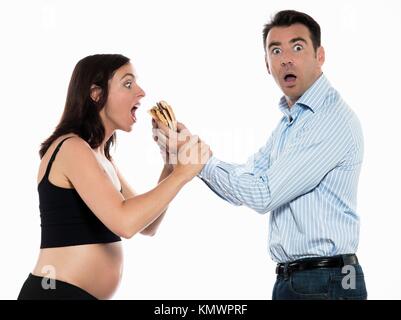 couple expecting baby hungry woman eat hamburger isolated studio on white background