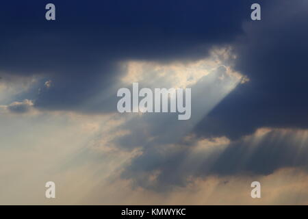 God light. Dramatic golden cloudy sky with sun beam. Yellow sun rays ...