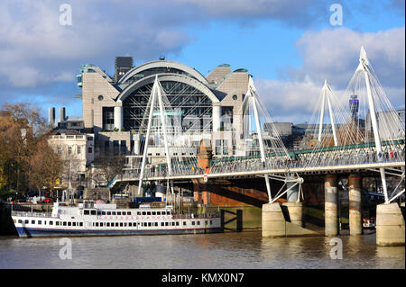 London, UK, 08/12/2017 Charing Cross X station and Hungerford Bridge taken from the South Bank of the Thames. Stock Photo