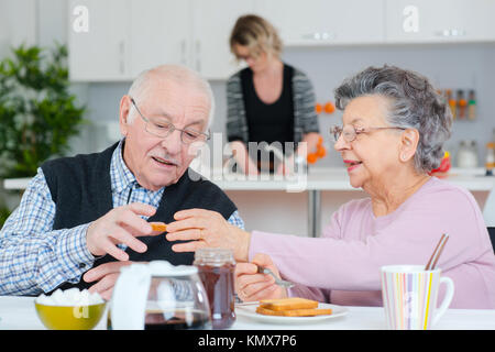 old couple having a nice breakfast Stock Photo