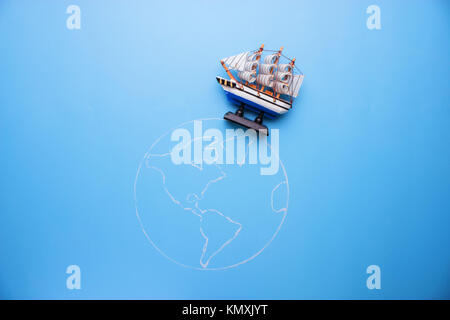 ship on the earth. trave around the world concept Stock Photo