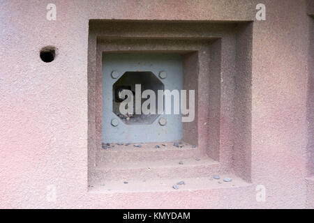 A machine gun embrasure at a personnel entrance to the Maginot Line site of Four à Chaux de Lembach, Alsace Stock Photo