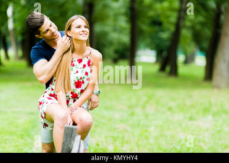 Happy couple loving each other outdoors Stock Photo