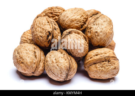 pile of walnuts isolated on white background Stock Photo