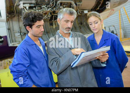 teacher with student in metallurgy workshop Stock Photo