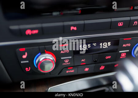 Close-up  of modern luxury car climate control panel. Stock Photo