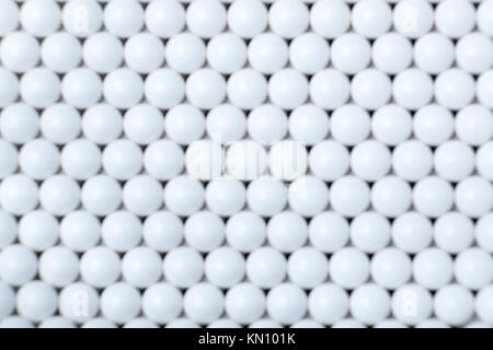 blurred background of white balls. airsoft 6mm. Stock Photo