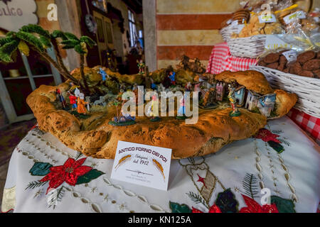 A Nativity Scene made with breads is on display at the window of a market stall in Follina in the Treviso countryside, on the 'Strada del Prosecco'. Stock Photo