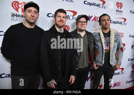 Joe Trohman, Andy Hurley, Patrick Stump and Pete Wentz of Fall Out Boy attend the Z100's Jingle Ball 2017 press room on December 8, 2017 in New York City. Stock Photo