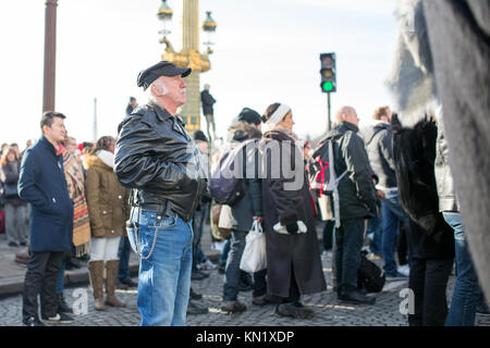 Paris, France. 09th Dec, 2017. Popular commemoration of the death of French singer Johnny Hallyday in Paris: a leather old guy mourning with emotion Credit: slaeinte/Alamy Live News Stock Photo