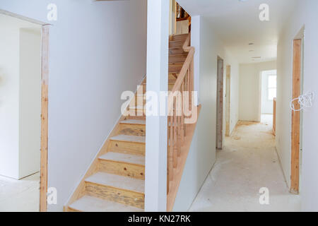 Interior construction of housing project with drywall installed and patched without building is a new house for the installation Stock Photo