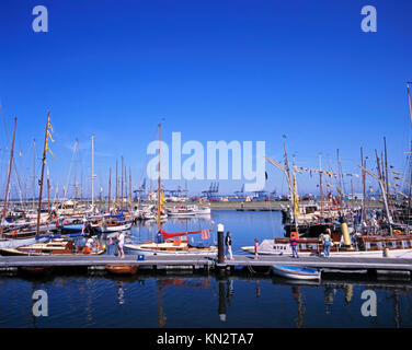 Shotley Marina with Felixstowe Dock cranes in distance, Shotley Gate, Suffolk, England, United Kingdom Stock Photo