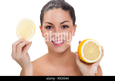 Beautiful woman with half of lemon Stock Photo