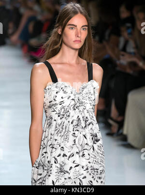 Estella Brons walks the runway during the Thom Browne fashion show as