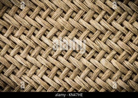 Weaving texture or weaving pattern background in macro style. Weaving texture classic retro background for design. Stock Photo