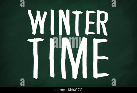 On the blackboard with chalk write Winter time Stock Photo