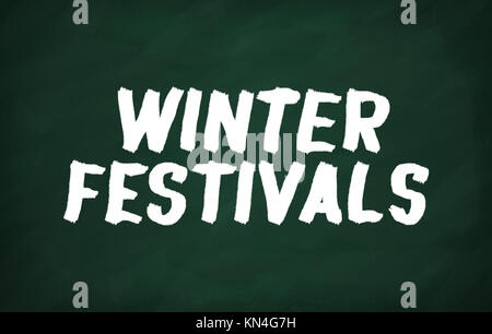 On the blackboard with chalk write Winter festivals Stock Photo