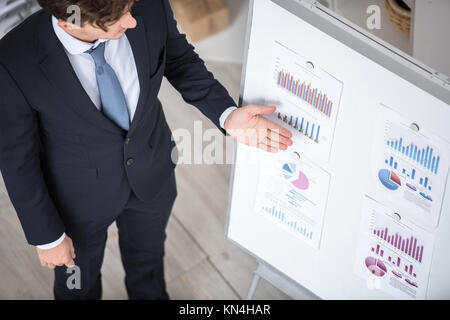 Businessman Giving Presentation in Office Stock Photo