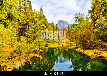 View of Half Dome and Merced River from Yosemite Valley in Yosemite National Park in autumn. Stock Photo