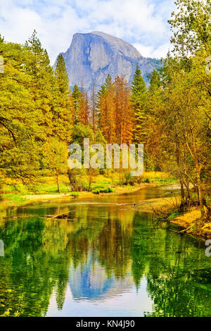 View of Half Dome and Merced River from Yosemite Valley in Yosemite National Park in autumn. Stock Photo