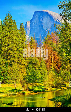 View of Half Dome and Merced River from Yosemite Valley in Yosemite National Park in autumn. Stock Photo