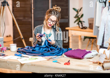 Fashion designer working at the office Stock Photo