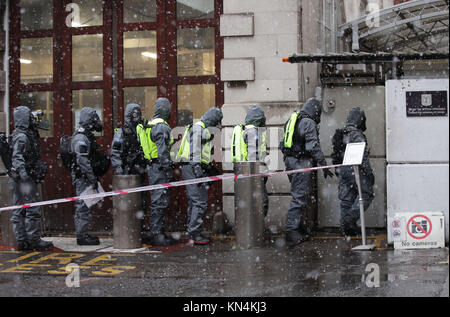 Members of the police, fire brigade and ambulance service during a joint exercise to test their response to a 'HAZMAT' type ncident involving a hazardous substance, at the Israeli Embassy in Kensington, London. Stock Photo