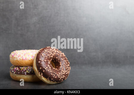 colorful donuts with coffee Stock Photo