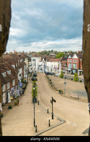 Aerial view of Battle High Street through a stone window in Battle Abbey, Battle, Sussex, England, UK Stock Photo