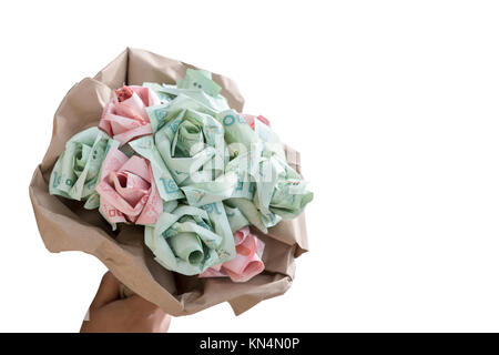Bouquet of artificial flowers from Thai banknotes Stock Photo