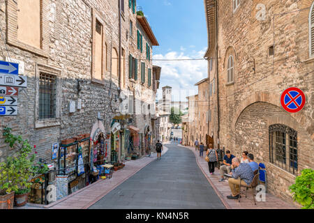 Shops on Via Piaggia San Pietro in the old town, Assisi, Umbria, Italy Stock Photo