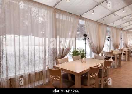 panorama of big cafe with a glass ceiling and walls Stock Photo