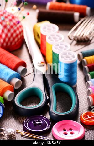 tailor or sewing accessories and supplies with tools at wooden table Stock  Photo by seregam