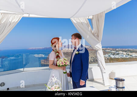 Wedding ceremony couple in Greece, island of Santorini Stock Photo