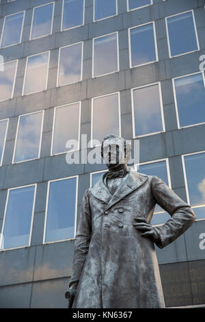 Statue and memorial to civil and railway engineer Robert Stephenson at Euston Station, London, UK - September 2015 Stock Photo