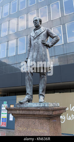 Statue and memorial to civil and railway engineer Robert Stephenson at Euston Station, London, UK - September 2015 Stock Photo