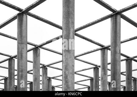 Cement Columns Chair Rough Texture Perspective Overhead Grid Geometric Pattern Design Outdoor Park Public Upright Minimal Bright Stone Stock Photo