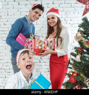 Boy being excited by Christmas present  Stock Photo