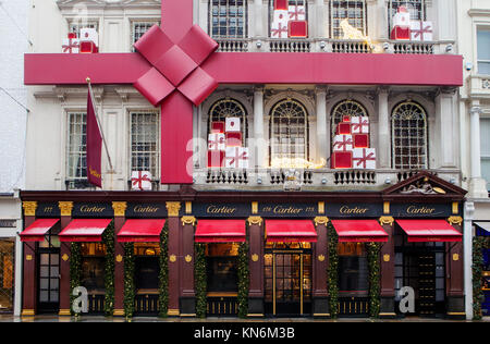 LONDON, UK - DECEMBER 10th, 2017: Cartier shop on New Bond Street gets decorated for Christmas period. Cartier has three flagship boutiques: Paris, Lo Stock Photo