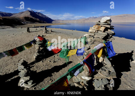 Prayer flags on the hill above Tso Moriri lake, Ladakh, Jammu and Kashmir, India. Stock Photo