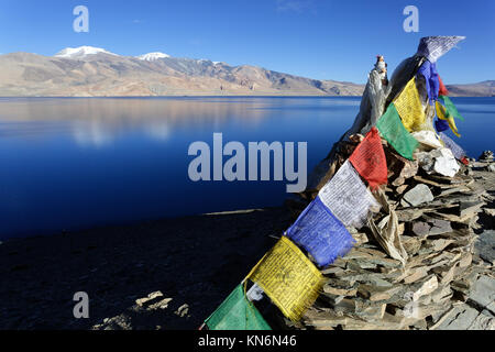Prayer flags on the hill above Tso Moriri lake, Ladakh, Jammu and Kashmir, India. Stock Photo